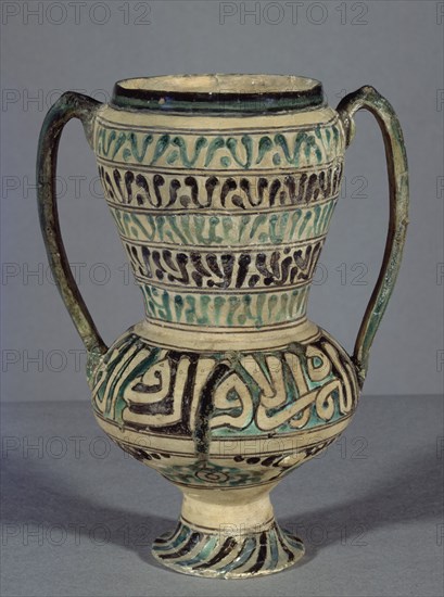 JARRA NAZARI DE CUERDA SECA CON DECORACION EPIGRAFICA NASJI-S XIV-XV(OTRA VISTA EN 80084)
GRANADA, MUSEO HISPANO-MUSULMAN
GRANADA
