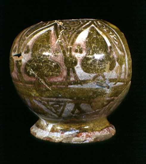 JARRITO DE LOZA DORADA-ALMOHADE S XII-XIII
CIUDAD REAL, MUSEO DE ARTE
CIUDAD REAL

This image is not downloadable. Contact us for the high res.