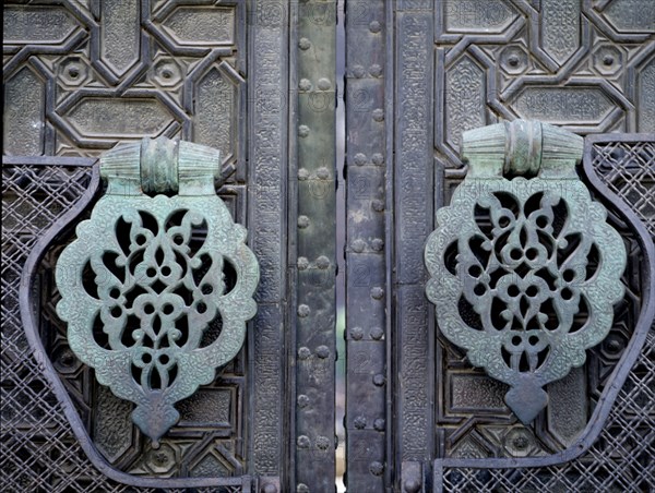 EXTERIOR-PUERTA PERDON-DET-ALDABONES-PALMETA ALMOHADE
SEVILLA, CATEDRAL
SEVILLA

This image is not downloadable. Contact us for the high res.