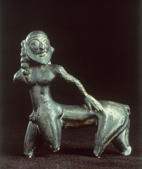CENTAURO DE ROYOS PROCEDENTE DE CAMPO DE CARAVACA (MURCIA) -  S VI AC - BRONCE
MADRID, MUSEO ARQUEOLOGICO NACIONAL
MADRID
