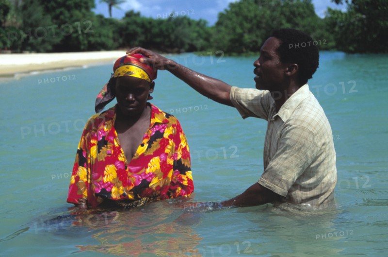 A baptism by immersion in the Indian Ocean off Zanzibar
