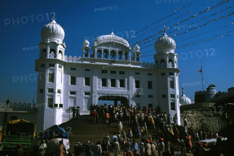 Sikh worshippers entering a gurdwara (temple) in Anantapur, India