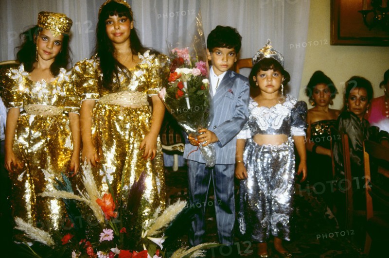 Newly circumcised boy and his sisters