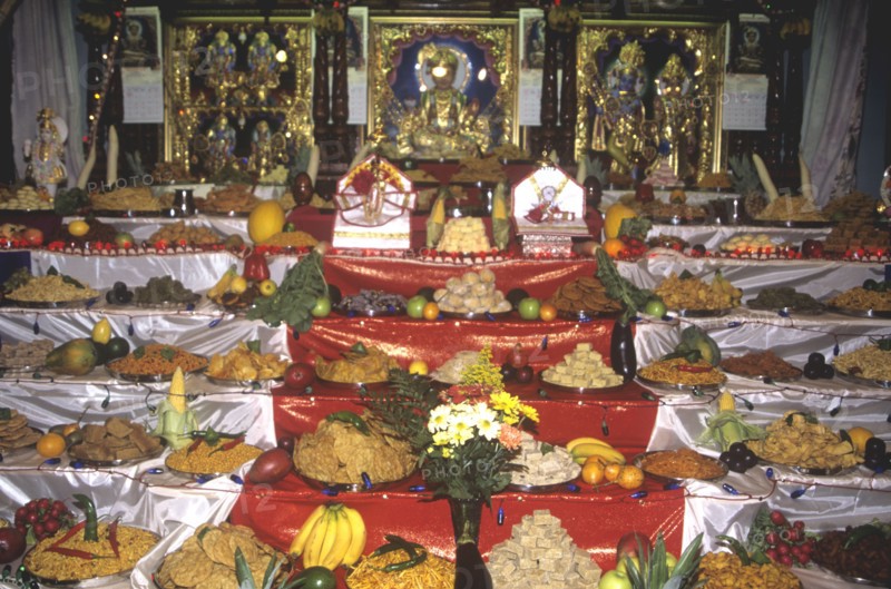 Hindu temple altar laden with food and fruits for Divali