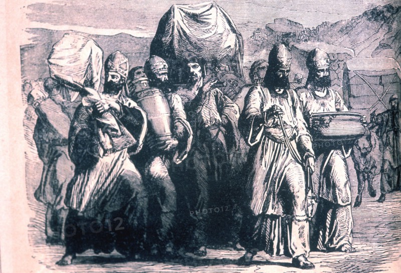 According to Hebrew records, the ark of the covenant was a sacred container holding the tablets on which were written the Ten Commandments as told to Moses by God. The bible recounts how the priests carried the covenant in advance of the Israelites and how the river JOrdan opened and allowed them to cross.  Various tales exist as to the fate of the Ark of the Covenant, the drawing shows Priests removing
it from Jerusalem to save it from the davaning Babylonian army.   19th century lithograph.