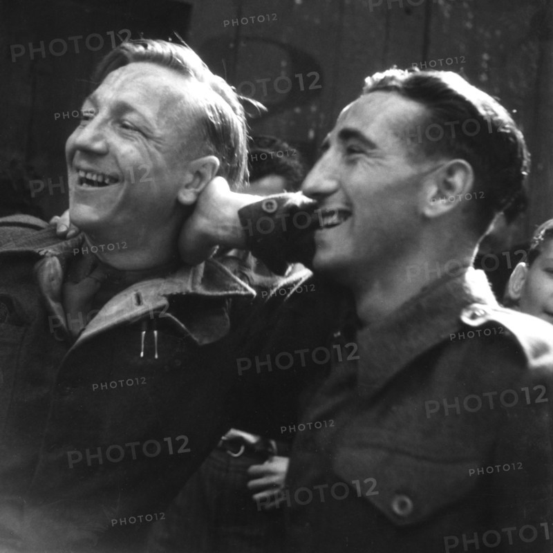 Scene of cheering people during the Liberation of Paris (August 1944)