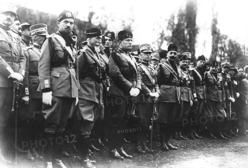 King of Italy, Mussolini and Marshal Badoglio attending a military ceremony