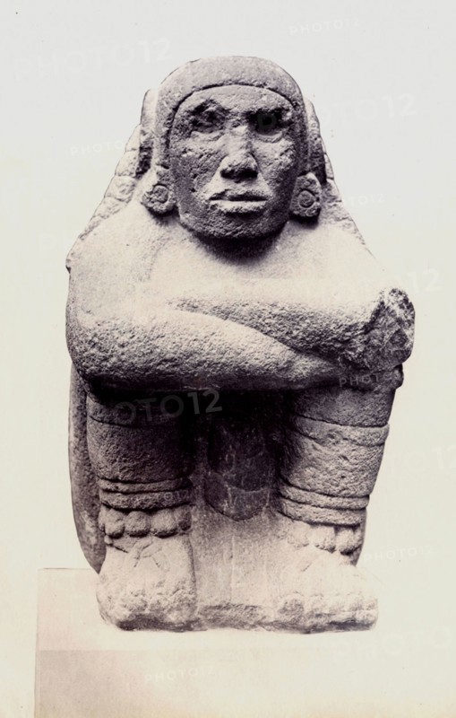 Stone seated figure of Xochipilli, British Museum