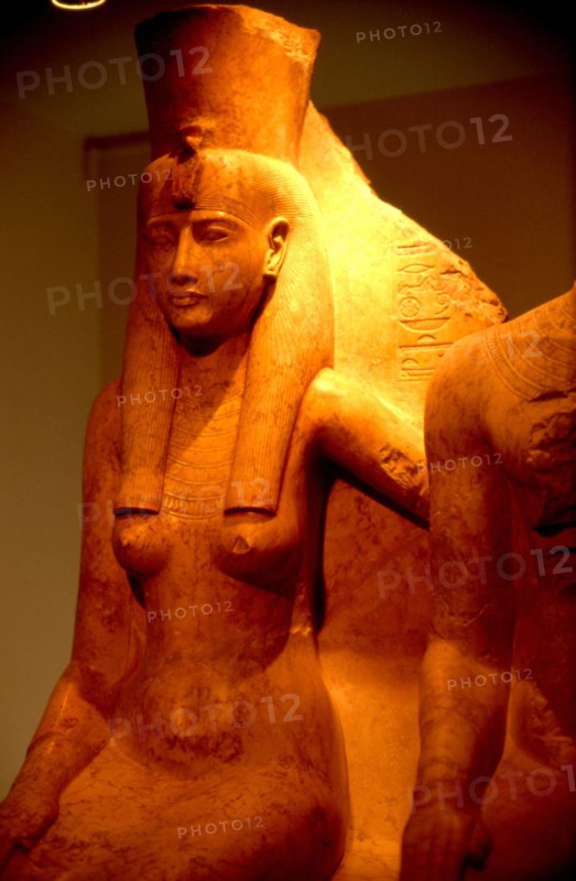 Seated goddess Mut, "mistress of AIcheru", protecting the king with her arm