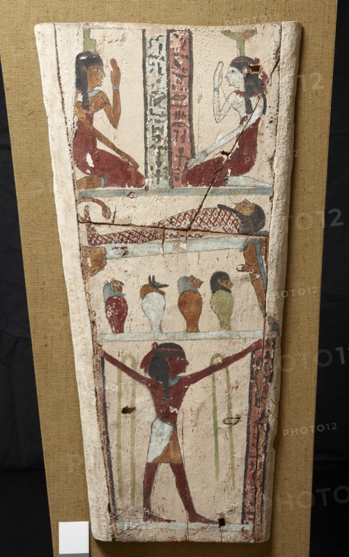 Egyptian painted wood and stucco sarcophagus panel