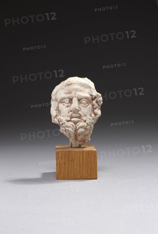 Egyptian mask applique figuring the head of a bearded man