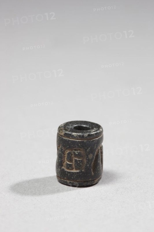 Sceau-cylindre gravé de signes hiéroglyphiques archaïques