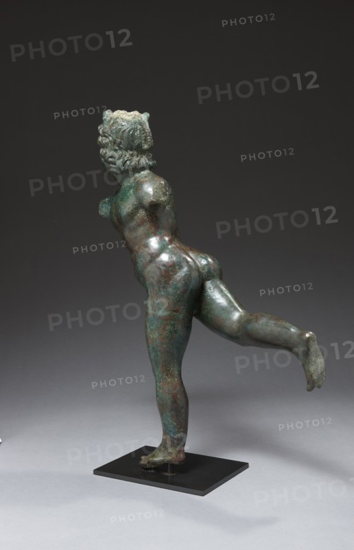 Roman statue figuring Eros Lampidarius