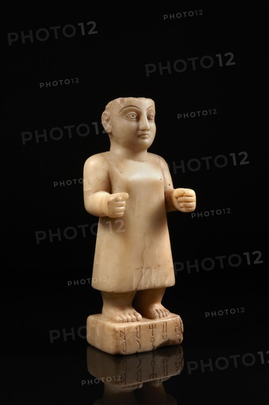 South Arabian statuette of a man inscribed with the name of Abhamid from the clan of Uhayrum