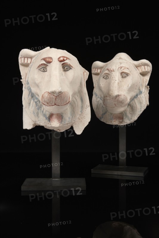 Two egyptian protome lion's head