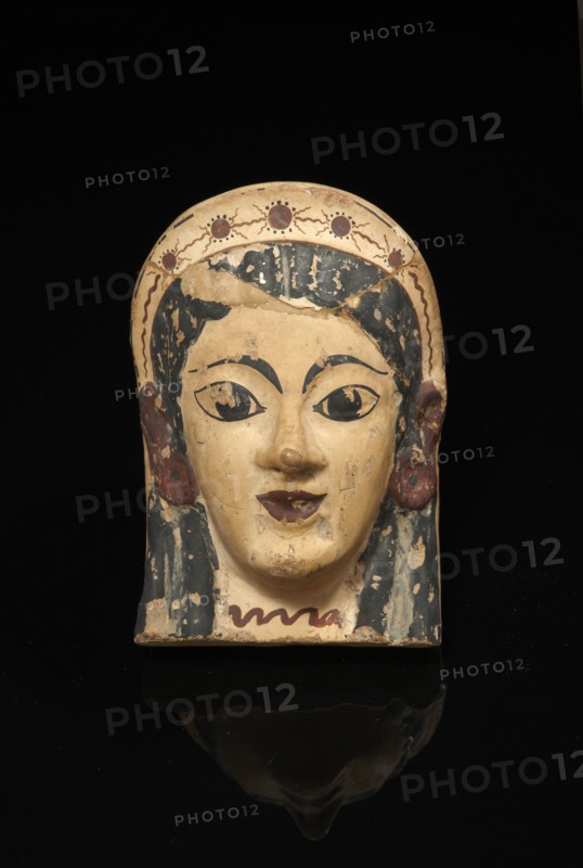 Antéfixe à visage féminin