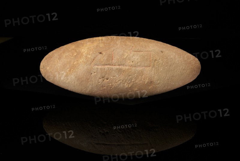 Neolithic engraved grinder