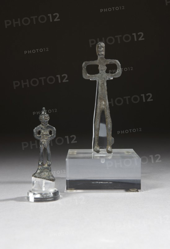 Two caucasian votive statuettes figuring stylized men