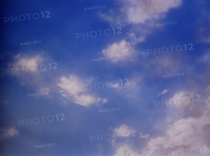 Cloudy sky. Painted canvas tarp