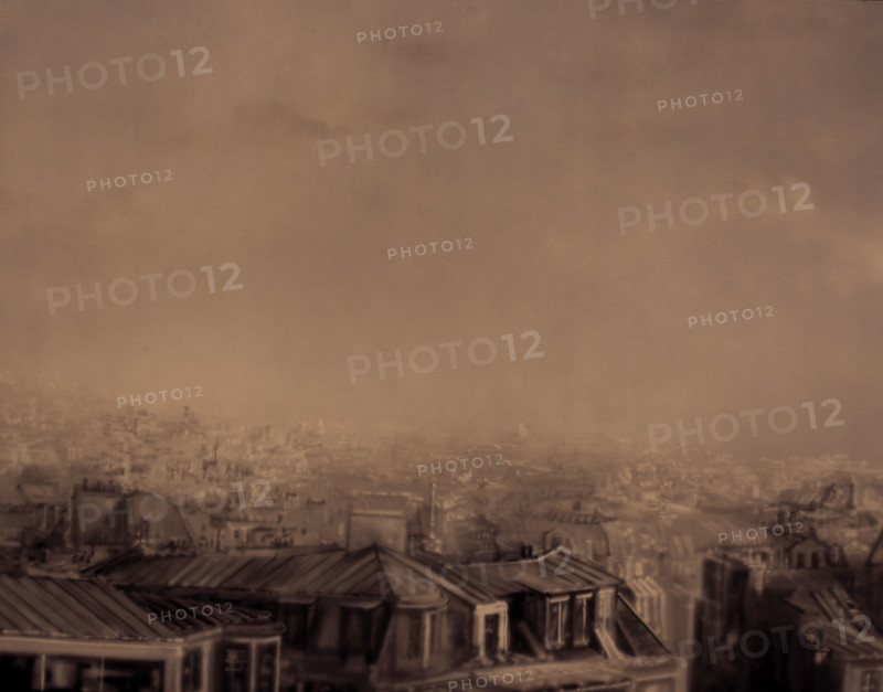 Painted backdrop. View over city roofs