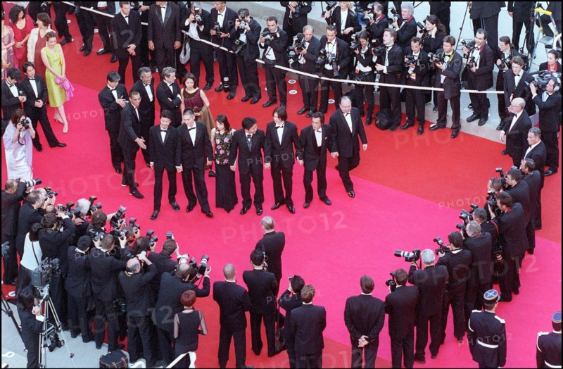 05/09/2001. 54th Cannes Film Festival: Francis Huster walking up the stairs.