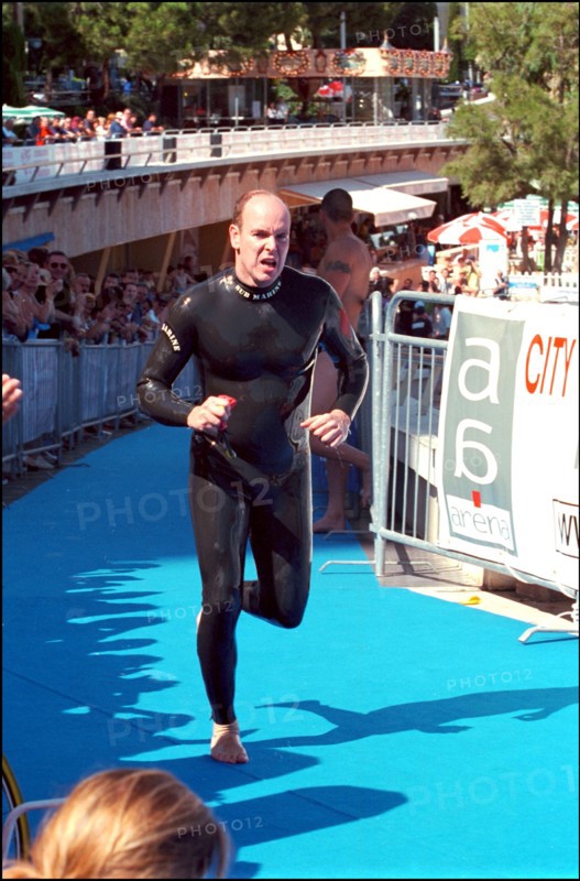 06/17/2001. Prince Albert of Monaco takes part in the first "All Stars Triathlon" in Monaco