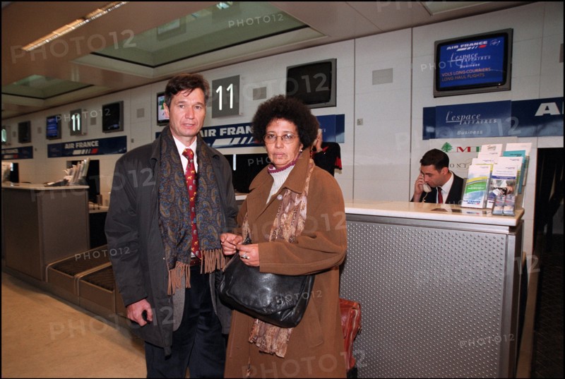 12/27/2001.  Alleged WTC terrorist Zacarias Moussaoui's mother Aicha leaves for Washington with her son's new lawyer François Roux.