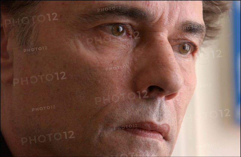 03/00/2003. Yves Simon, at home.