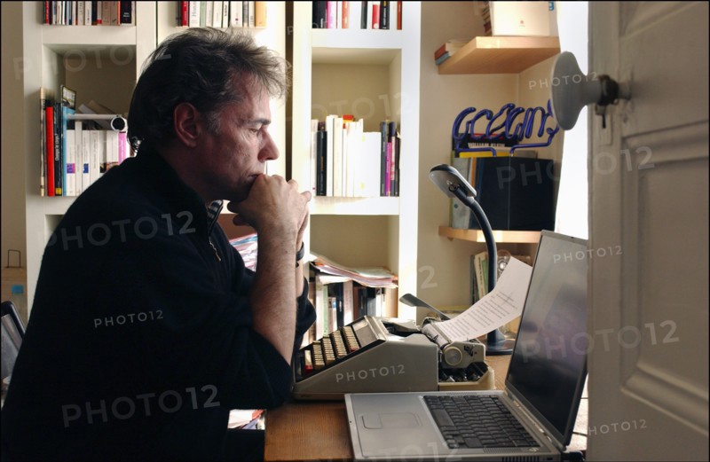 03/00/2003. Yves Simon, at home.