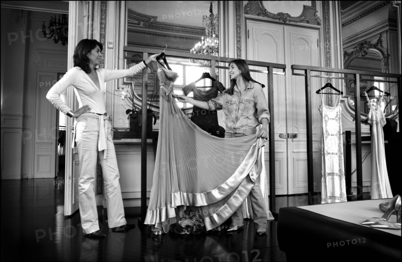 05/00/2003. Clotilde Courau tries gowns on at Valentino's before the 56th Cannes Film