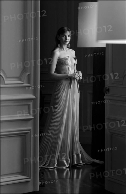 05/00/2003. EXCLUSIVE Clotilde Courau tries gowns on at Valentino's before the 56th Cannes Film