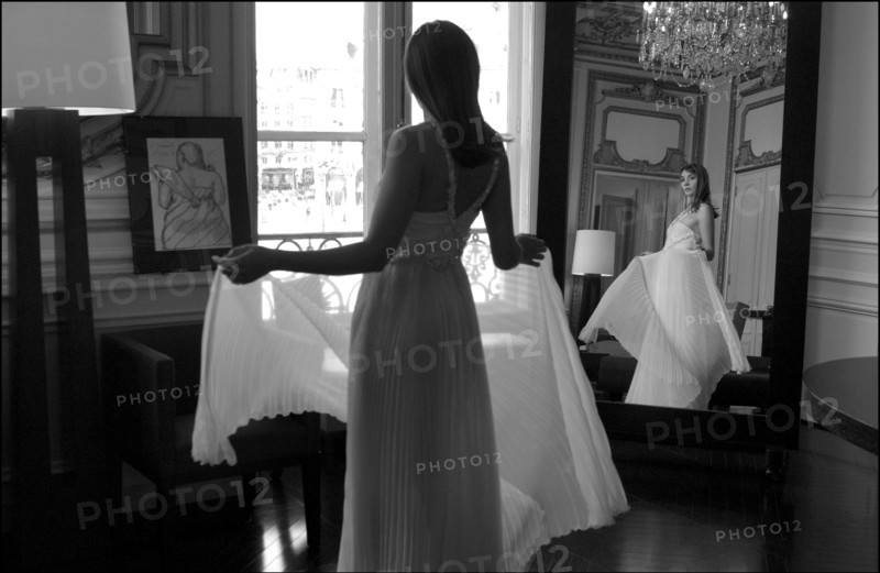05/00/2003. EXCLUSIVE Clotilde Courau tries gowns on at Valentino's before the 56th Cannes Film