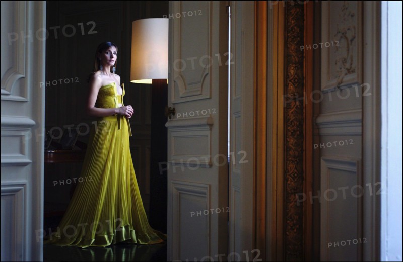 05/00/2003. Clotilde Courau tries gowns on at Valentino's before the 56th Cannes Film