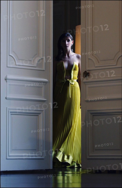 05/00/2003. EXCLUSIVE Clotilde Courau tries gowns on at Valentino's before the 56th Cannes Film