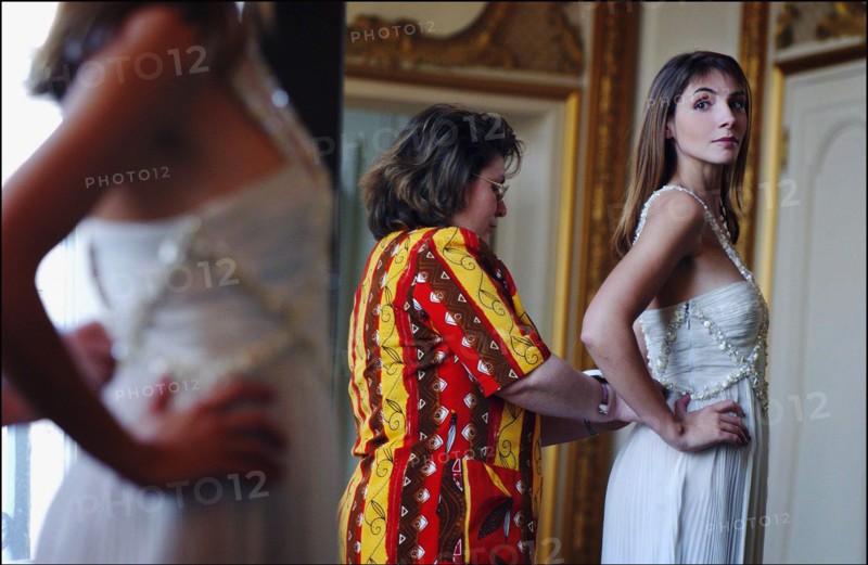 05/00/2003. EXCLUSIVE Clotilde Courau tries gowns on at Valentino's before the 56th Cannes Film