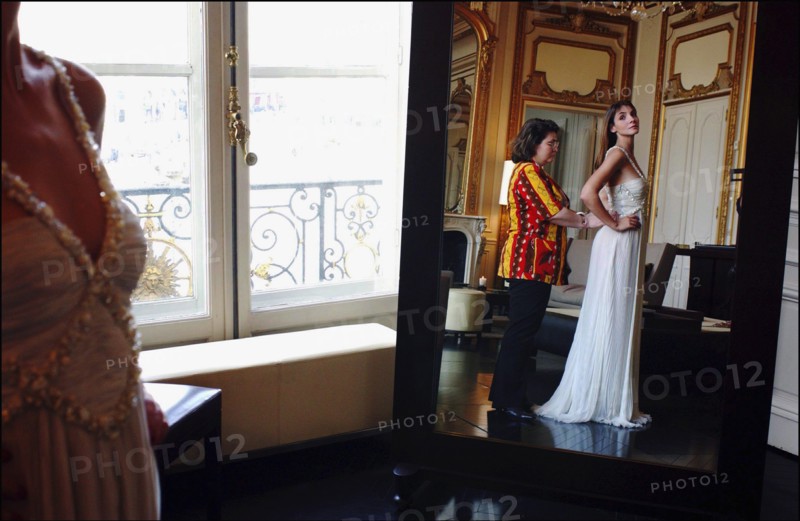 05/00/2003. EXCLUSIVE Clotilde Courau tries gowns on at Valentino's before the 56th Cannes Film