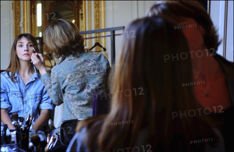05/00/2003. Clotilde Courau tries gowns on at Valentino's before the 56th Cannes Film