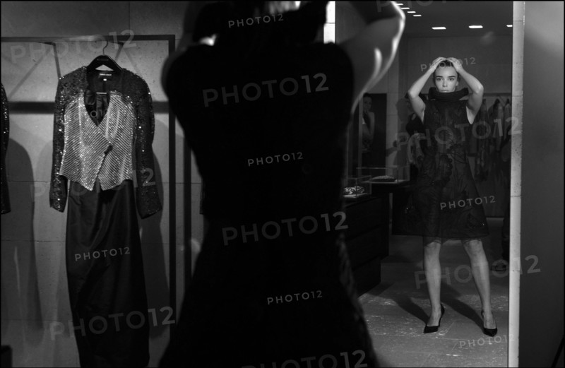 05/00/2003. EXCLUSIVE Elodie Bouchez tries gowns on at Armani's before the 56th Cannes Film