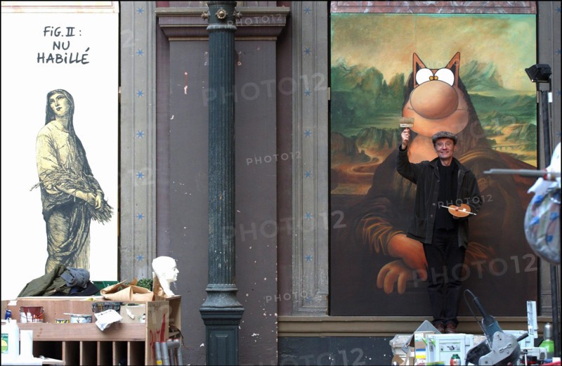 10/24/2003. Belgian cartoonist and TV host Phillipe Geluck's art exhibit at the Beaux-Arts, Paris : a first for any comic strip artist.