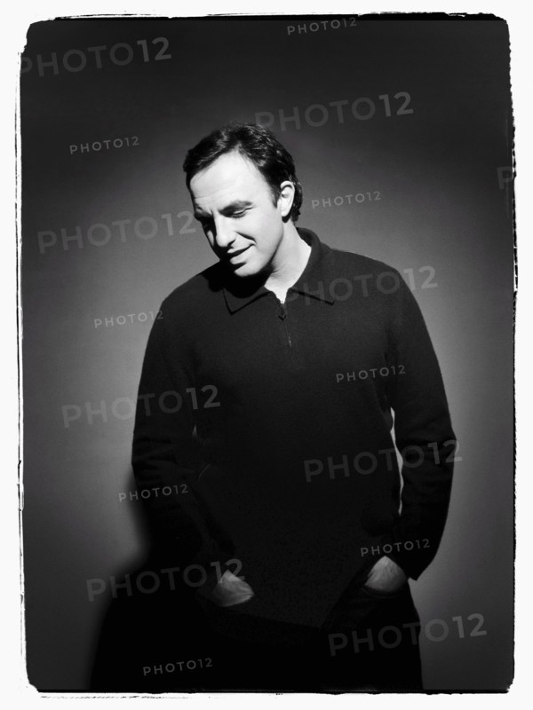 12/00/2003. Nikos Aliagas, host of the Star Academy shows backstage and on stage.