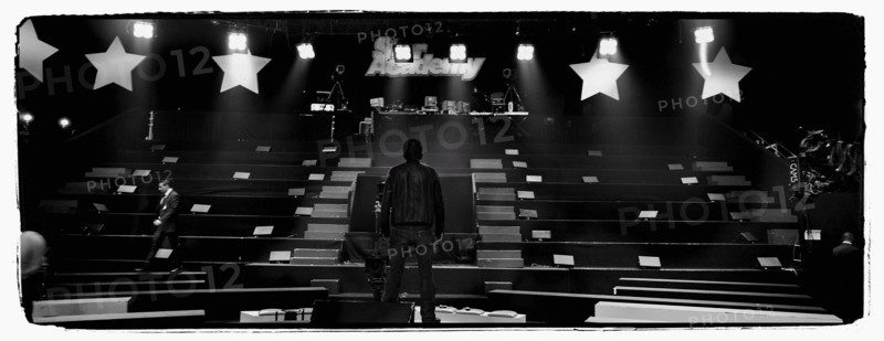 12/00/2003. Nikos Aliagas, host of the Star Academy shows backstage and on stage.