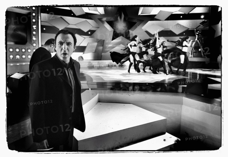 12/00/2003. Nikos Aliagas, host of the Star Academy shows backstage and on stage.