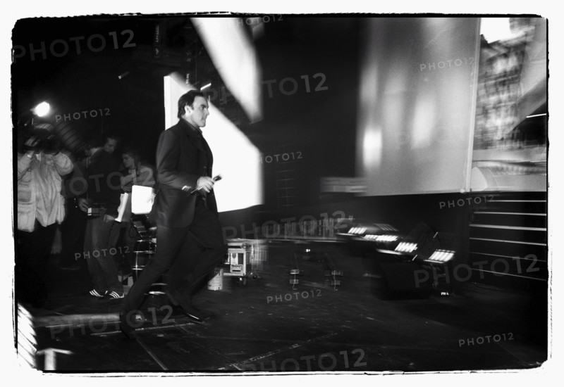 12/00/2003. Nikos Aliagas, host of the Star Academy shows backstage and on stage.