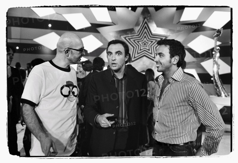 12/00/2003. Nikos Aliagas, host of the Star Academy shows backstage and on stage.