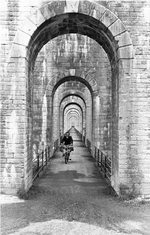 Motorcyclist at Cize-Bolozon viaduct, France