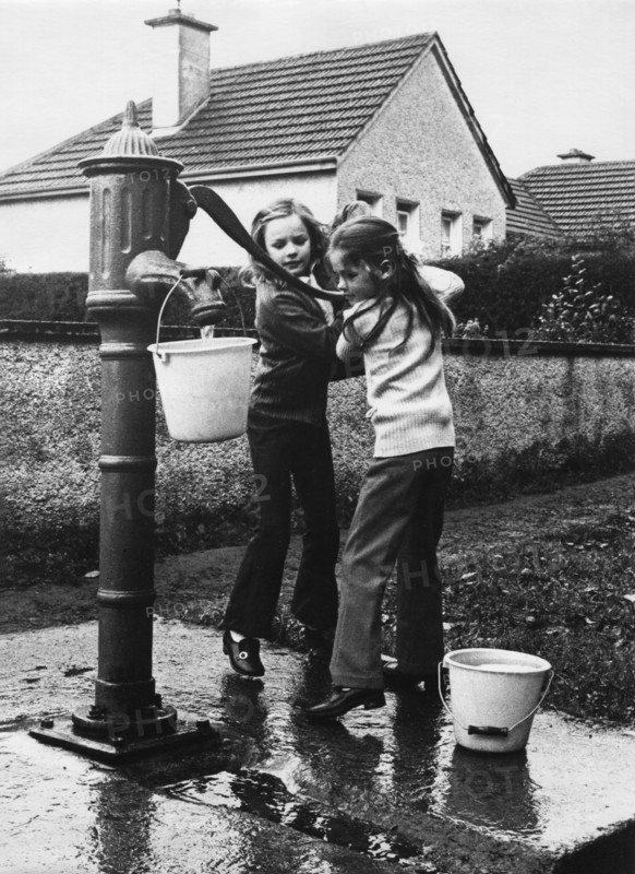 Collecting water from pump, Co Meath