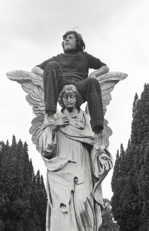 Boy on angel; Glasnevin Cemetery; Dublin