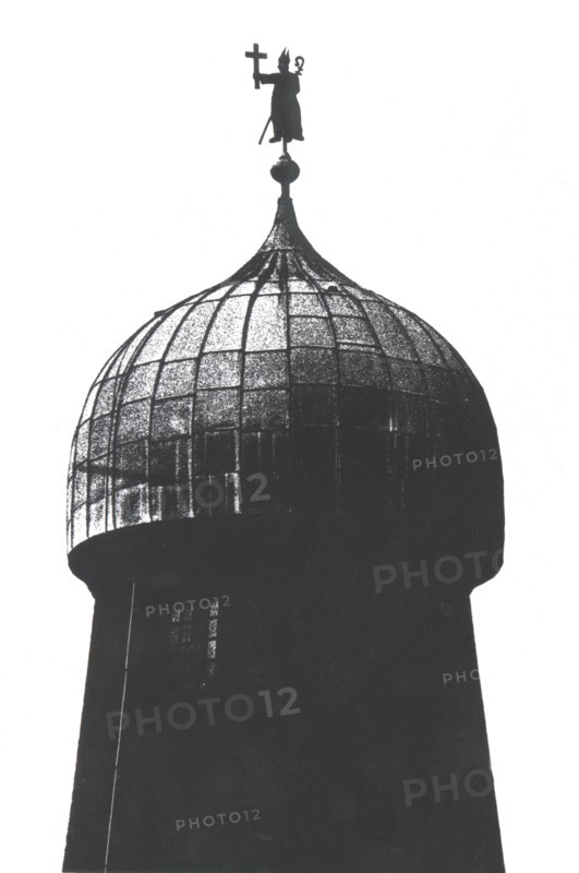 Old windmill tower with Saint Patrick