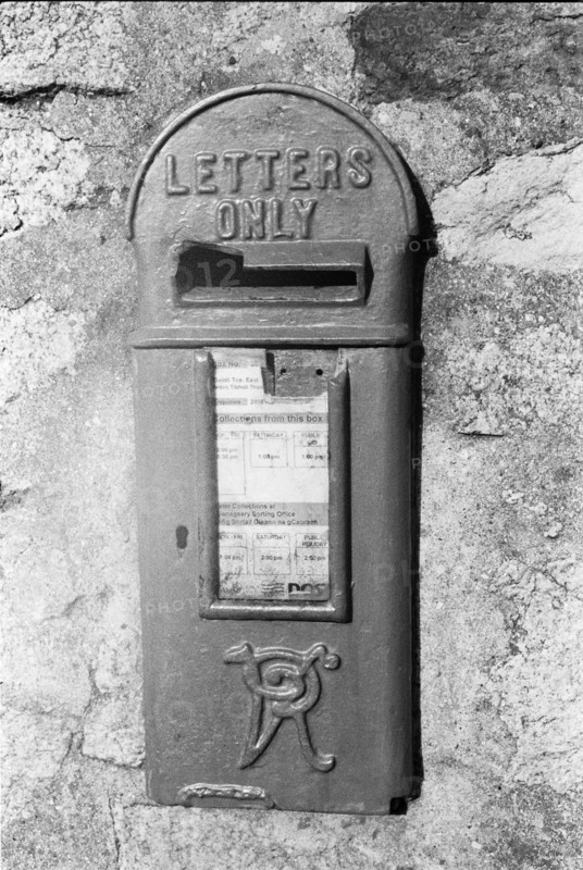 Victorian-era post box set into a stone wall, bearing the inscription "Letters only". County Dublin, Ireland.
1980