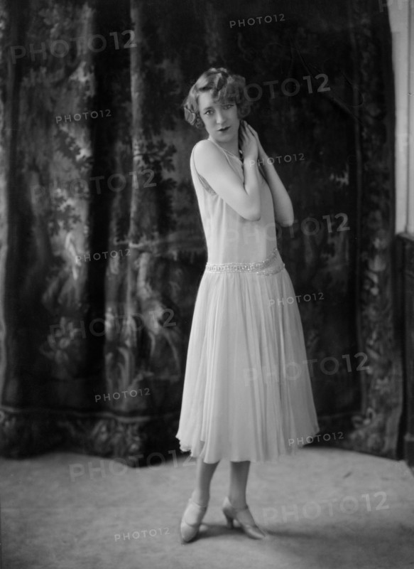 Annette Wills wearing a dress designed by Worth